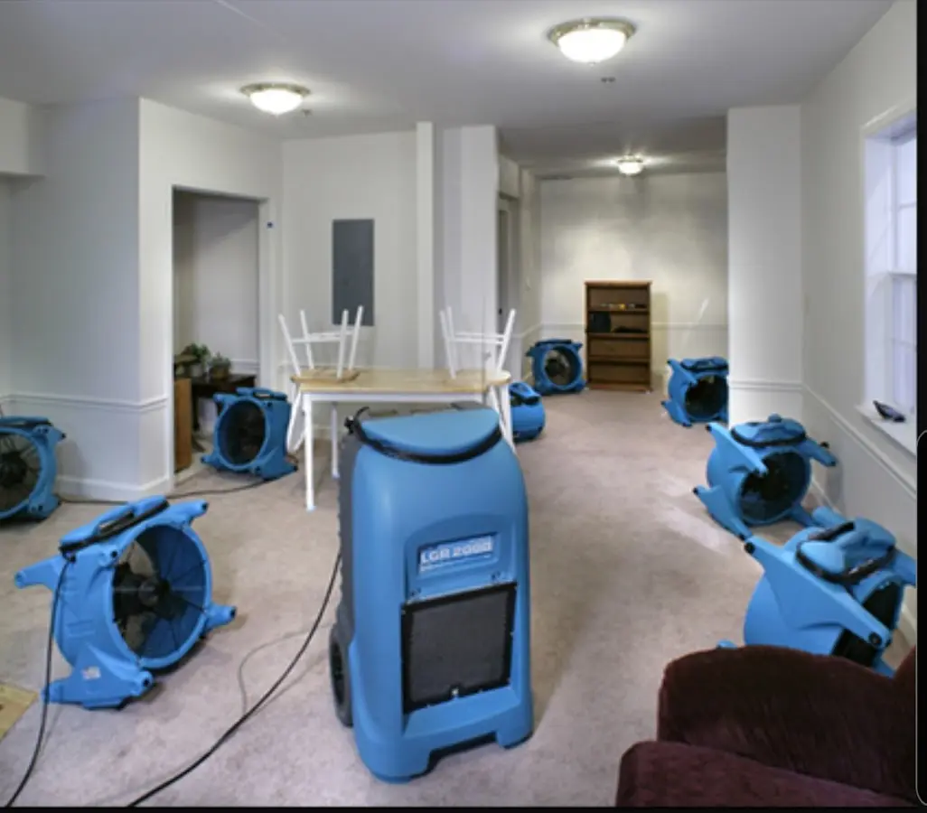 Air movers and dehumidifier setup for Water Damage Restoration in Schriever